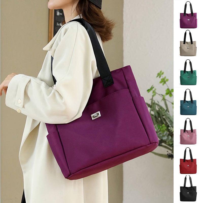 50% di sconto - AquaGo - Leggera borsa a tracolla in nylon resistente all'acqua - Sconto limitato