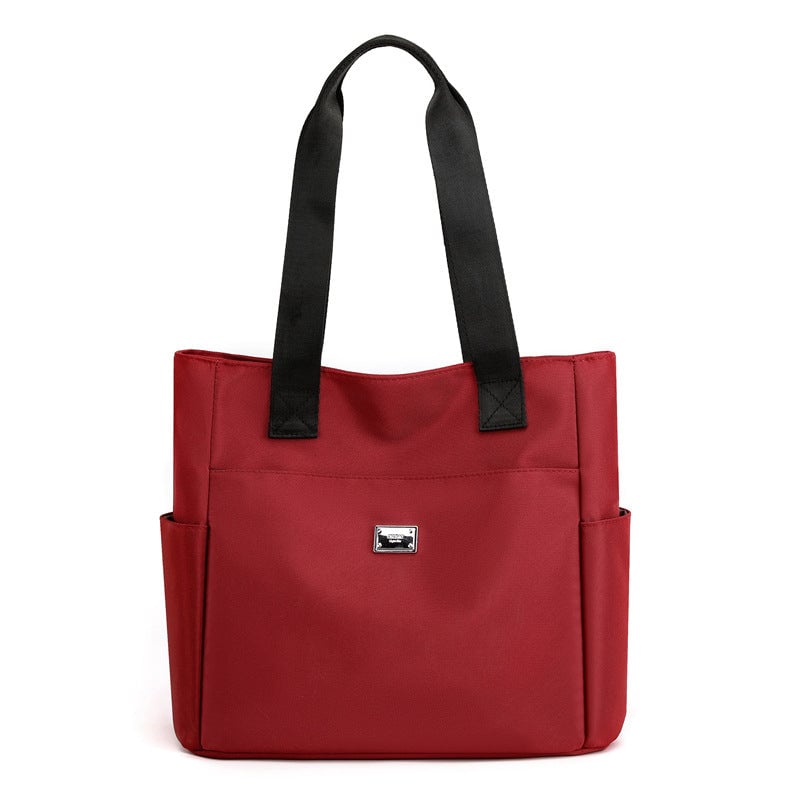 50% di sconto - AquaGo - Leggera borsa a tracolla in nylon resistente all'acqua - Sconto limitato