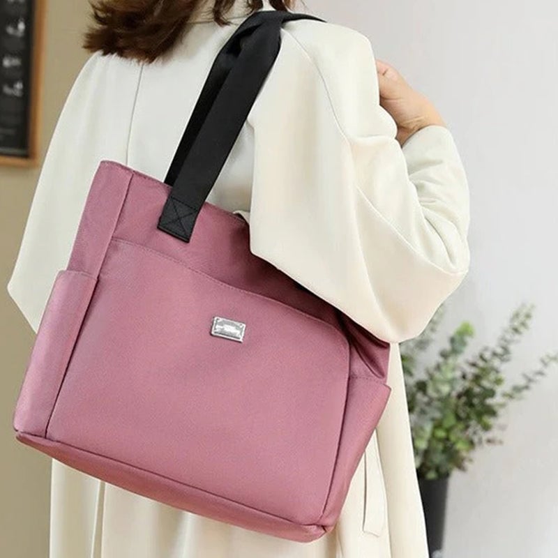 50% di sconto - AquaGo - Leggera borsa a tracolla in nylon resistente all'acqua - Sconto limitato