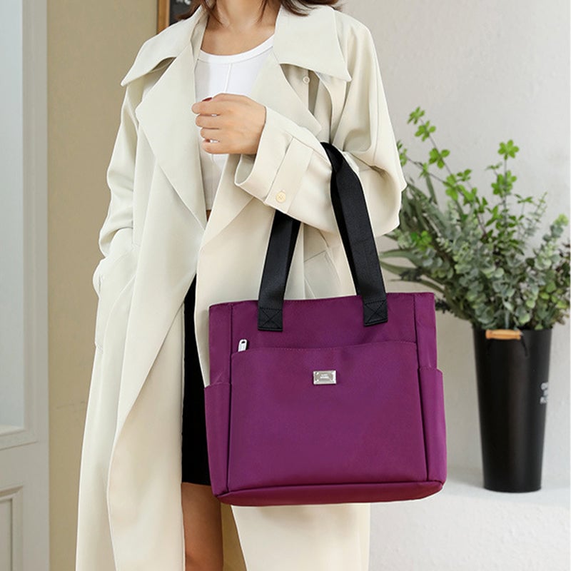 50% di sconto - AquaGo - Leggera borsa a tracolla in nylon resistente all'acqua - Sconto limitato