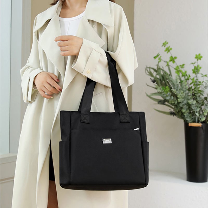 50% di sconto - AquaGo - Leggera borsa a tracolla in nylon resistente all'acqua - Sconto limitato