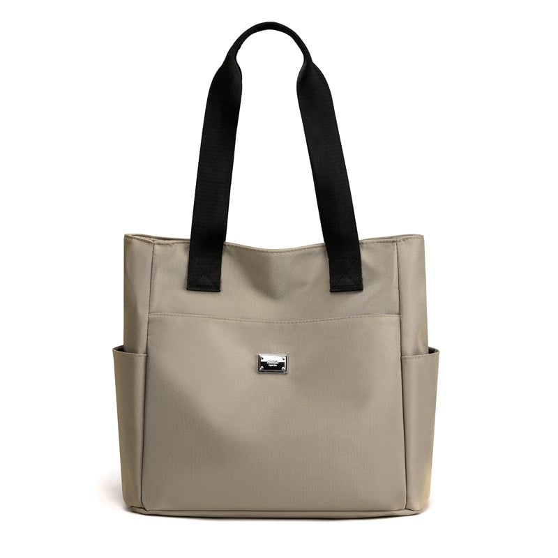 50% di sconto - AquaGo - Leggera borsa a tracolla in nylon resistente all'acqua - Sconto limitato