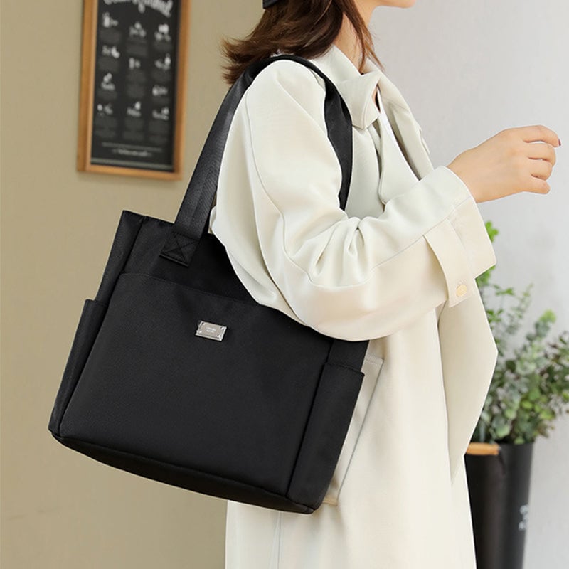 50% di sconto - AquaGo - Leggera borsa a tracolla in nylon resistente all'acqua - Sconto limitato